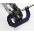 AK-Builder Rail Alignment Fixture within an in-the-white AK receiver, front secured by C-clamp.