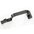 Angled view of AK-Builder Saiga 12 trigger guard component, dark finished steel with rivet/screw holes.