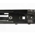 AK-Builder Saiga 12 trigger guard, black finished, overhead view, showing mounting and grip screw holes.