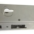 Close-up of AK receiver flat in the white, showing formed selector cutout and lower bend details.