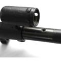 Close-up of black Bulgarian AK74 gas block and barrel with drilled gas port.