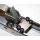 Trigger guard screw plate in the white, with four black screws installed in receiver.